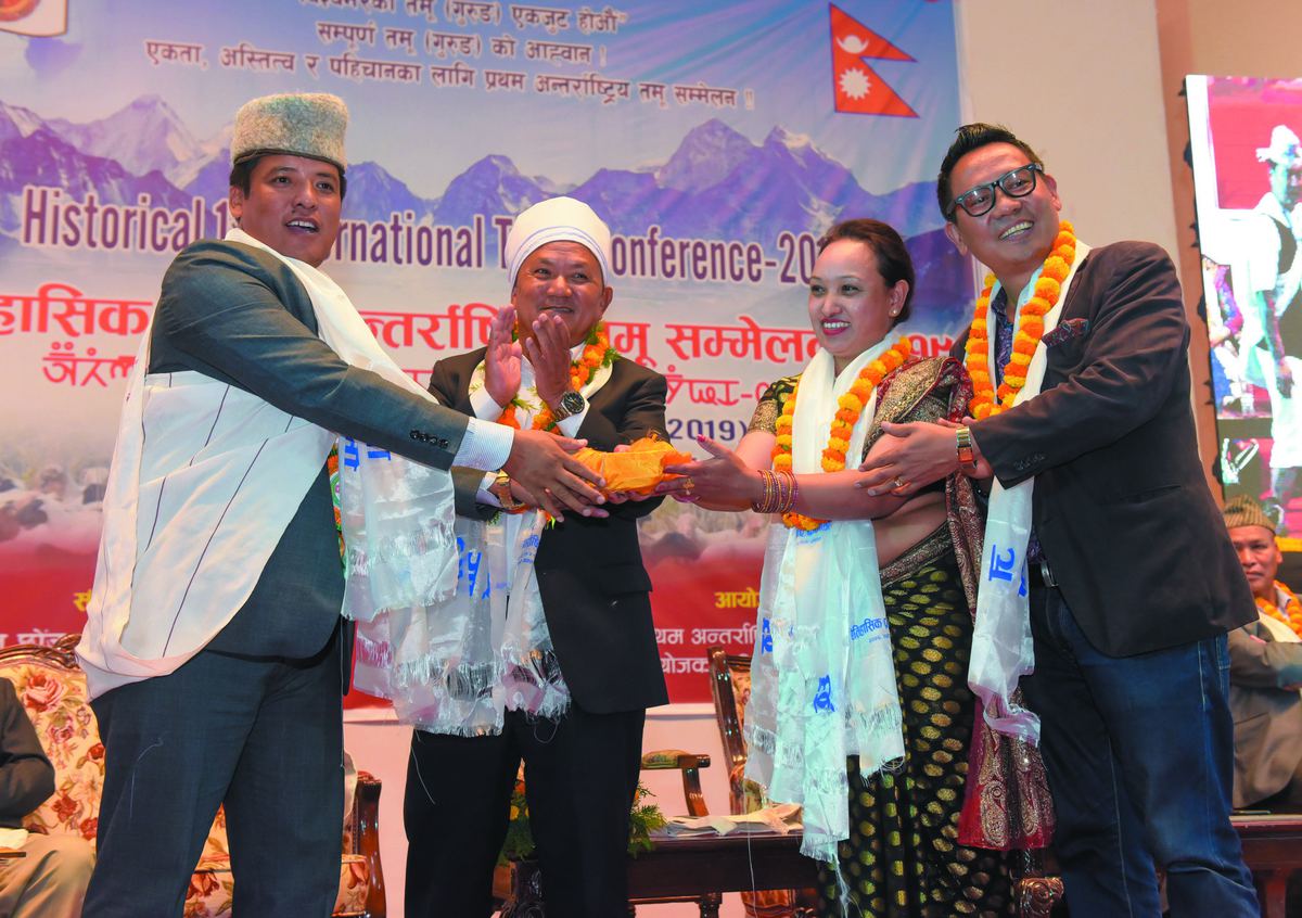 Dignitaries being felicitated with khada scarves at the 2019 conference